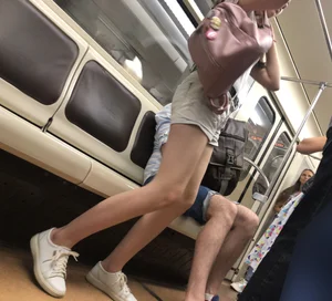 Cute Teen Girl in Shorts in Subway Train Candid Photos
