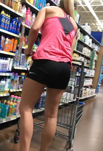 Sexy blonde ass in spandex shorts shopping at Walmrt