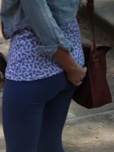 Hot blonde girl in tight blue leggings with nice ass