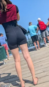 Very slim asian in black short legging. (VPL) OC