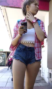 Sexy girl walking in short shorts showing her ass cheeks and nice legs