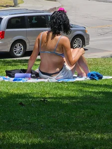 Suntanning Season is back! Black Thong Girl Tanning!