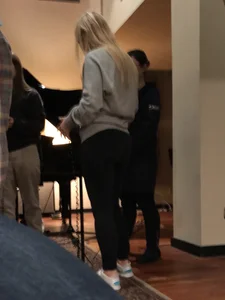 A hot blonde with beautiful smile and nice ass in leggings