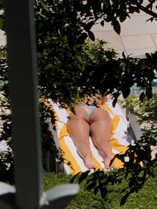 (OC) Blonde girl tanning poolside