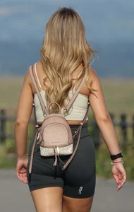 Blonde woman in lycra shorts - good front view, back view ruined by a bag