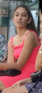 Candid teen in a pink short dress at the bus stop creepshot