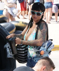 Girls in bikinis getting ready for tubing