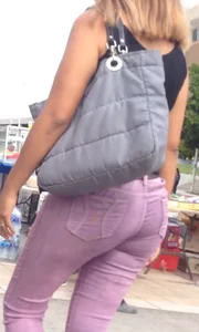 Black babe with a nice ass in tight jeans and vpl
