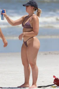 Awesome big booty white girl in a thong bikini on the beach