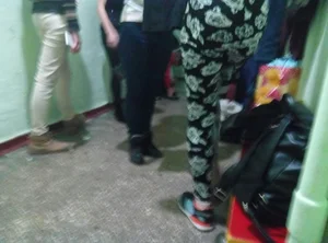 Booty in Tight Pants in a College Corridor