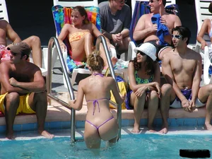 Beach voyeur girls in bikinis, thongs and topless