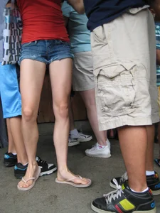 Skinny babe with nice legs in denim shorts