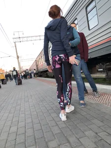 Skinny Teen With Nice Thin Legs in Spandex Tights Hugging Her Friends at a Railway Station Photos