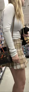Busty butter face in a skirt and tight top