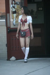 Two sexy Tilted Kilt employees showing cleavage and cheeks