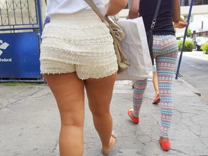 Big ass in shorts and ebony friend in leggings