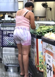 Thick Latina babe with a nice ass in tight patterned shorts