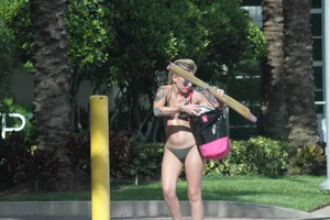 Sexy alt bikini babe with a nice body and tattoos