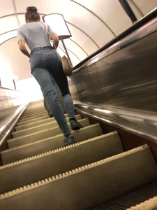 Tall Girl With a Big Sexy Butt And Long Skinny Legs in Tight Jeans on a Subway Escalator Creepshots