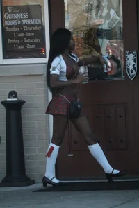 Sexy ebony Tilted Kilt employee in her uniform