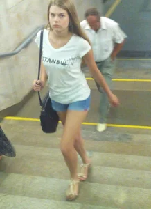 Cute Girl in Denim Mini Shorts and Sandals Goind Up the Stairs Street Creepshot