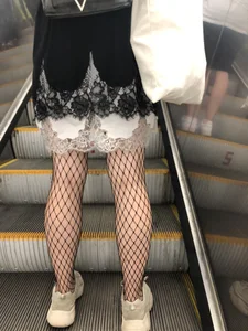 Cute Girl in Lacey Semi-Transparent Dress and Fishnet Pantyhose Subway Escalator Candid Photos Gallery