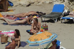 Girls on a nude beach in Sitges, Spain
