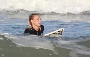 Hot surfer chicks out in the water
