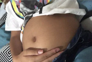 Pregnant tummy closeup selfie