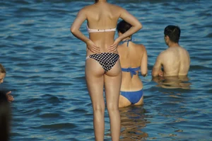 Wet Girl with Hot Body in Swimsuit Standing by the Water on the Beach Creepshot Gallery