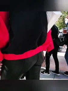 Ass in leather pants closeups on the street