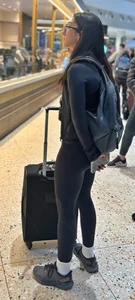 Cute girl with glasses in leggings
