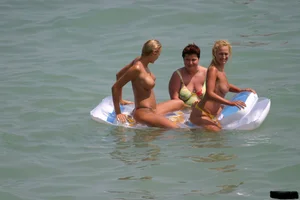 Beach voyeur babes in bikinis, thongs and topless