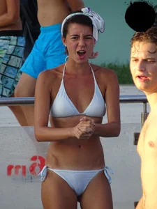 Sexy bikini babe in a white bikini at the pool with camel toe