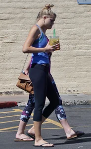Sexy blonde and friend walking in leggings