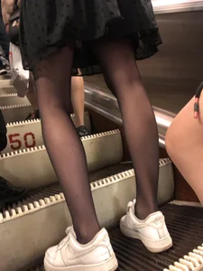 Thin Hot Legs in Black Pantyhose and a Seethrough Skirt on the Subway Escalator Creepshots