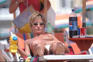 Girls on a nude beach in Bibione, Italy