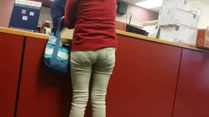 Latino milf at the post office in tight jeans with vpl