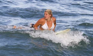 Candid surfer babes on the beach and in bikinis