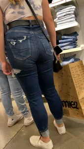 Two blonde teens shopping