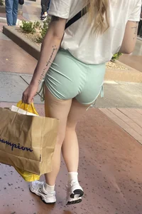 Sexy blonde in green shorts