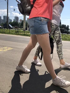 Candid girls passing by, denim shorts and nice pale legs
