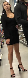 Brunette trophy wife in black dress