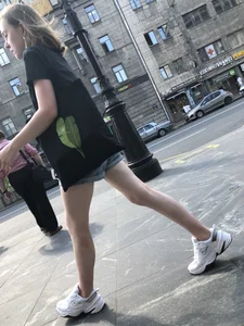 Candid Teen in Denim Shorts And Sneakers With Slim Legs Street Photos