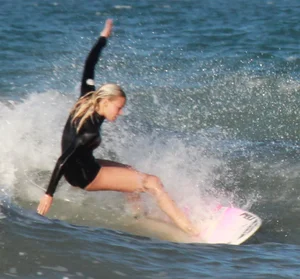 Hot surfer chicks out in the water
