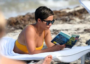 Frankie Bridge nip slips in a bikini on the beach