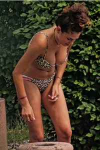 Hot big boobed girl in bikini at the pool