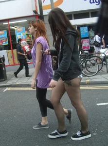 Candid cunny brunette in pantyhose and shorts showing her ass cheeks