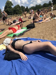 Skinny candid girl lying on the beach creepshots gallery