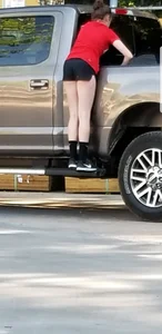 Girl in Shorts Getting Something in Her Car - Pale Legs